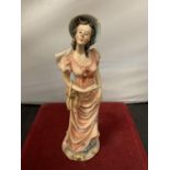 A CAPODIMONTE FIGURINE IN THE FORM OF A YOUNG WOMAN (FINGER A/F)