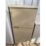 AN UPRIGHT FRIDGE FREEZER BELIEVED IN WORKING ORDER BUT NO WARRANTY