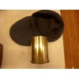 A 1944 DATED 25 POUND SHELL CASE AND TWO RAF BERETS