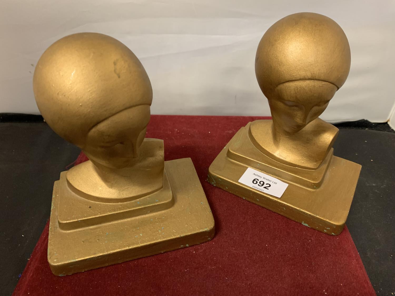 A PAIR OF ART DECO METAL BOOKENDS