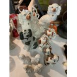 A LARGE COLLECTION OF STAFFORDSHIRE DOGS AND FIGURES