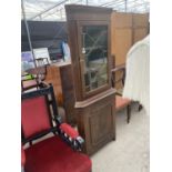 A MAHOGANY CORNER CABINET