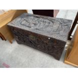 A HEAVILY CARVED CAMPHOR WOOD CHEST