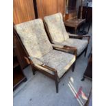 A PAIR OF PARKER KNOLL STYLE FIRESIDE CHAIRS