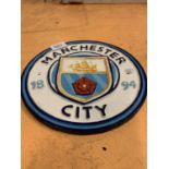 A 'MANCHESTER CITY' CAST METAL PLAQUE