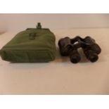 A PAIR OF 1941 TAYLOR-HOBSON X 2 BINOCULARS AND WEBBING CASE, ANOTHER PAIR OF BINOCULARS AND A SPARE