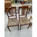 A PAIR OF MAHOGANY RUSH SEATED BEDROOM CHAIRS