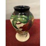 A MOORCROFT ANNA LILY VASE 4 INCHES TALL