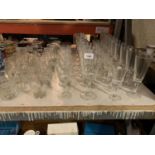 A LARGE ASSORTMENT OF GLASSWARE