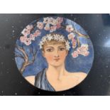 A CIRCULAR MINTON PLAQUE BY LUCIEN BOULLEMIER OF A MAIDEN