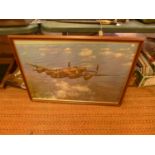 A LARGE FRAMED PHOTOGRAPH OF A LANCASTER BOMBER