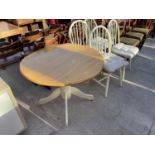 A MODERN DUNELM DROP-LEAF KITCHEN TABLE AND FOUR WINDSOR STYLE CHAIRS