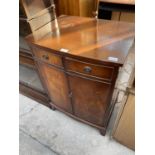 A MAHOGANY TWO DOOR STEREO CABINET, 24" WIDE