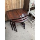 A NEST OF THREE MAHOGANY TABLES