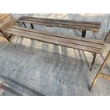 A WOODEN SLATTED VINTAGE CHANGING ROOM BENCH