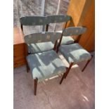 A SET OF FOUR RETRO TEAK FRAMED DANISH DINING CHAIRS