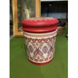 A SET OF THREE GRADUATED PINK PAISLEY LEATHER EFFECT LIDDED STORAGE STOOLS