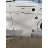 A WHITE BOSCH SLIMLINE DISHWASHER BELIEVED IN WORKING ORDER BUT NO WARRANTY