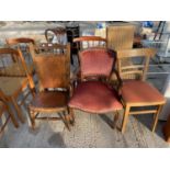 AN EDWARDIAN NURSING CHAIR, CONTINENTAL STYLE ELBOW CHAIR, TWO KITCHEN CHAIRS, WICKER CHAIR AND