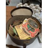 A VINTAGE HAT BOX OF ASSORTED VINTAGE BEER MATS