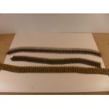 THREE INERT MACHINE GUN BELTS, LENGTHS 64CM, 84CM AND 94CM (3)