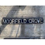 A VINTAGE CAST IRON 'MOORFIELD GROVE' ROAD SIGN