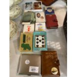 A VARIETY OF DECKS OF CARDS TO ALSO INCLUDE A WHITE METAL CIGARETTE CASE