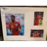 A SIGNED PHOTOGRAPH OF MARCUS RASHFORD MANCHESTER UNITED STAR WITH TWO FURTHER PHOTOGRAPHS IN A