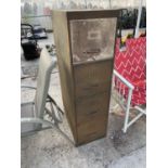 A VINTAGE 4 DRAWER METAL FILING CABINET