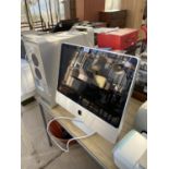 AN APPLE MAC COMPUTER WITH MONITOR AND HARD DRIVE (NO MOUSE OR KEYBOARD)