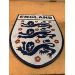 AN ENGLAND CAST METAL SIGN 30CM X 22CM