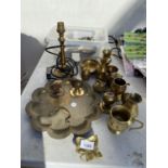 AN ASSORTMENT OF BRASS WARE TO INCLUDE A CANDLESTICK CONVERTED TO A LAMP AND A FURTHER ASSORTMENT OF