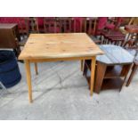 A PINE KITCHEN TABLE AND TV TABLE