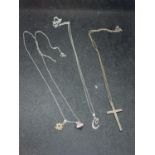 THREE SILVER NECKLACE SWITH PENDANTS TO INCLUDE A CROSS, C AND A FLOWER ETC