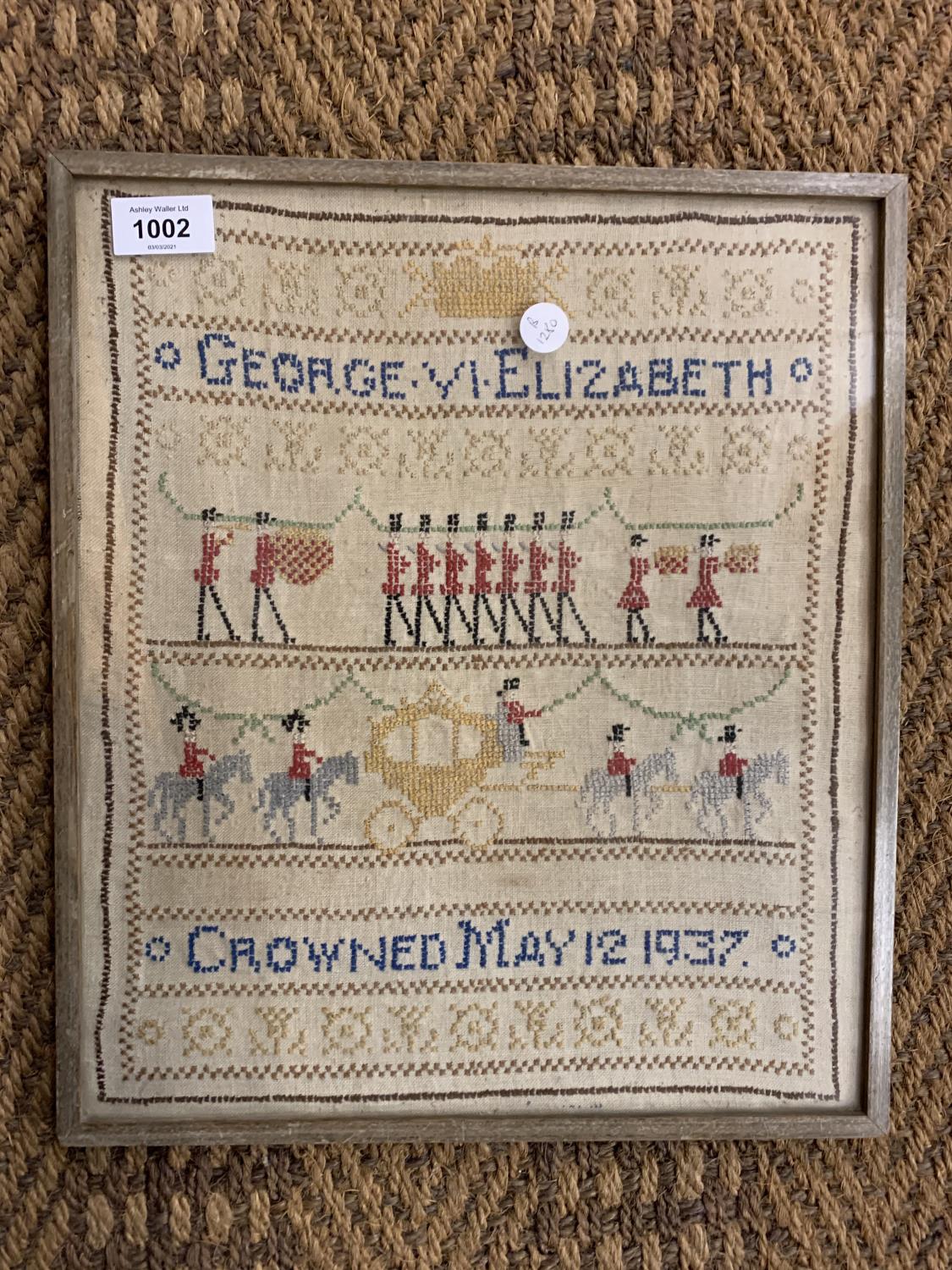 A FRAMED NEEDLEWORK SAMPLER