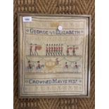 A FRAMED NEEDLEWORK SAMPLER