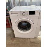 A WHITE BEKO 9KG WASHING MACHINE BELIEVED IN WORKING ORDER BUT NO WARRANTY