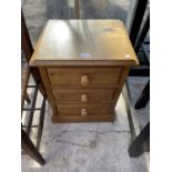 A SMALL MODERN PINE CHEST OF THREE DRAWERS