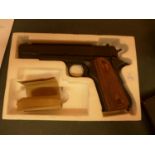 A BOXED NON FIRING REPLICA U.S. ARMED FORCES 1911 PISTOL