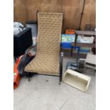 A RATTAN STYLE CAST IRON FRAMED GARDEN CHAIR