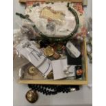 A DECORATIVE BOX CONTAINING A VARIETY OF NECKLACES, BUTTONS ETC