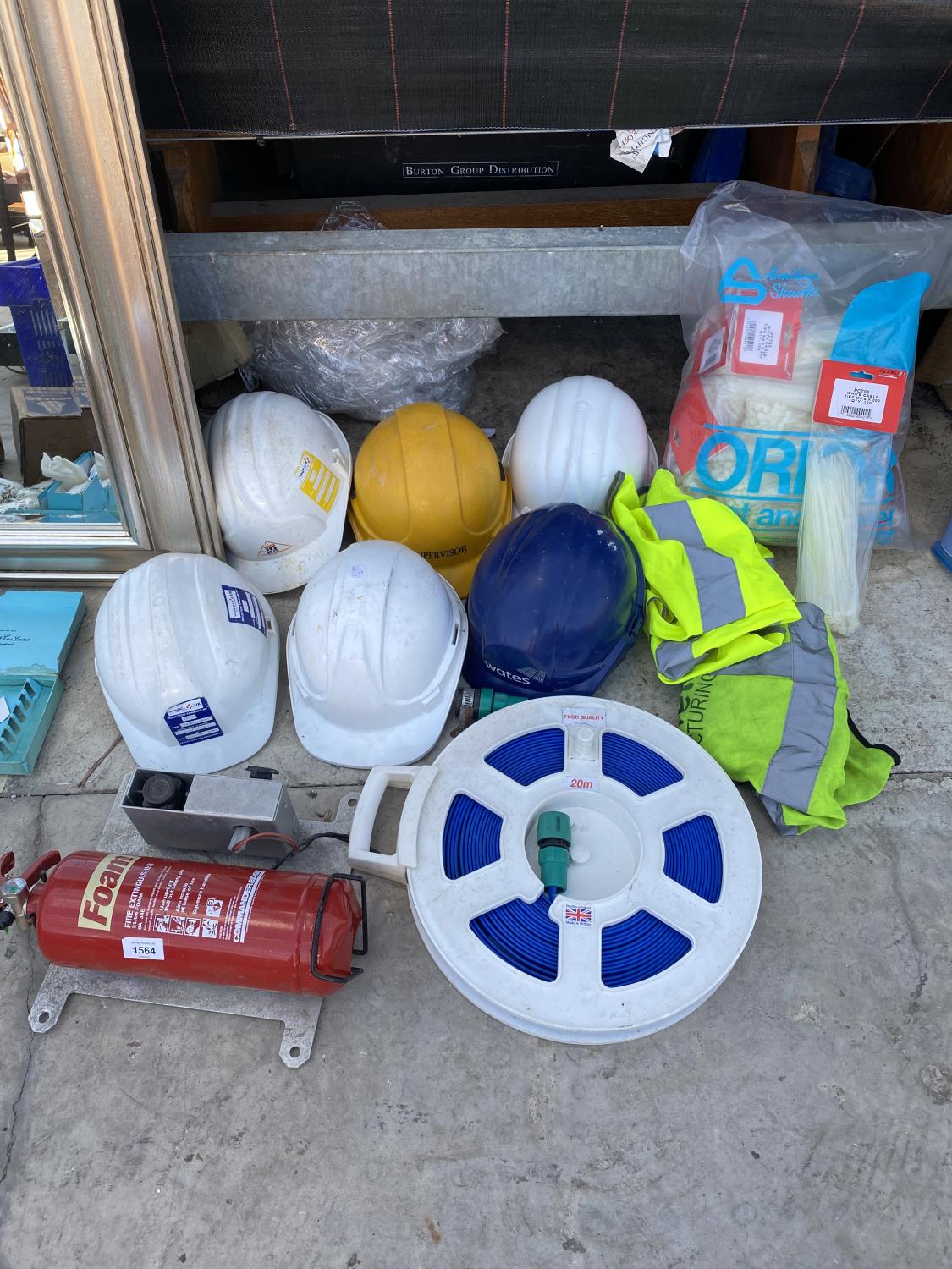 AN ASSORTMENT OF HEALTH AND SAFETY ITEMS TO INCLUDE HI VIZ JACKETS AND HARD HATS ETC