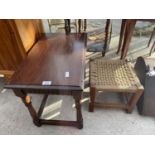 A SMALL STOOL WITH WICKER TOP AND SMALL OAK OCCASIONAL TABLE