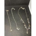 THREE SILVER NECKLACES WITH PENDANTS TO INCLUDE A SWIRL WITH CLEARSTONE, A C AND VARIOUS COLOURED