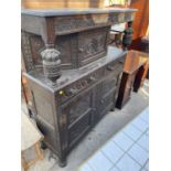 A JACOBEAN STYLE OAK COURT CUPBOARD, 49" WIDE