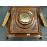 AN ORNATE VINTAGE BAROMETER TO INCLUE TWO INTEGRAL CLOTHES BRUSHES AND COAT HOOKS