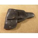 A BLACK LEATHER F AND B 7760 PISTOL HOLSTER
