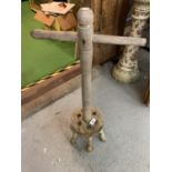 A VINTAGE WOODEN DOLLY PEG