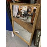 A LARGE GILT FRAMED MIRROR (H:110 CM W: 84 CM)