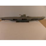 A LARGE PAINTED PLASTIC MODEL OF THE NAZI GERMANY U-BOAT U.552, LENGTH 92CM